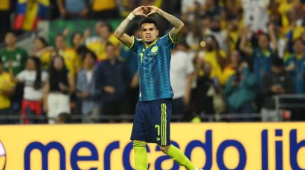 Luis Díaz celebrando o gol marcado em Uzbequistão x Colômbia, confronto válido pela primeira rodada da Copa do Mundo • David Ramos/Getty Images