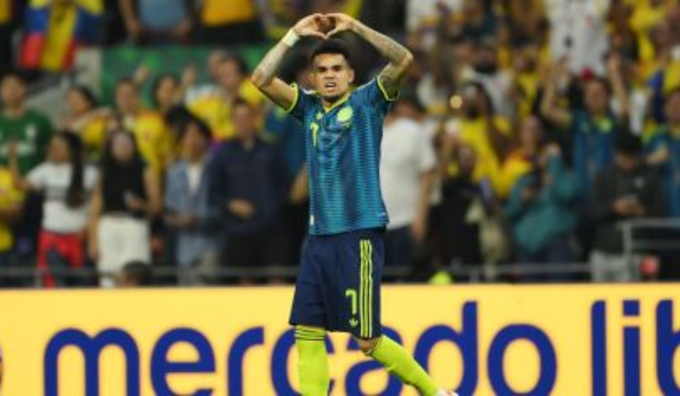 Luis Díaz celebrando o gol marcado em Uzbequistão x Colômbia, confronto válido pela primeira rodada da Copa do Mundo • David Ramos/Getty Images