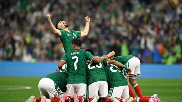 Jogadores do México celebram gol na segunda fase da Copa do Mundo Alfredo ESTRELLA / AFP